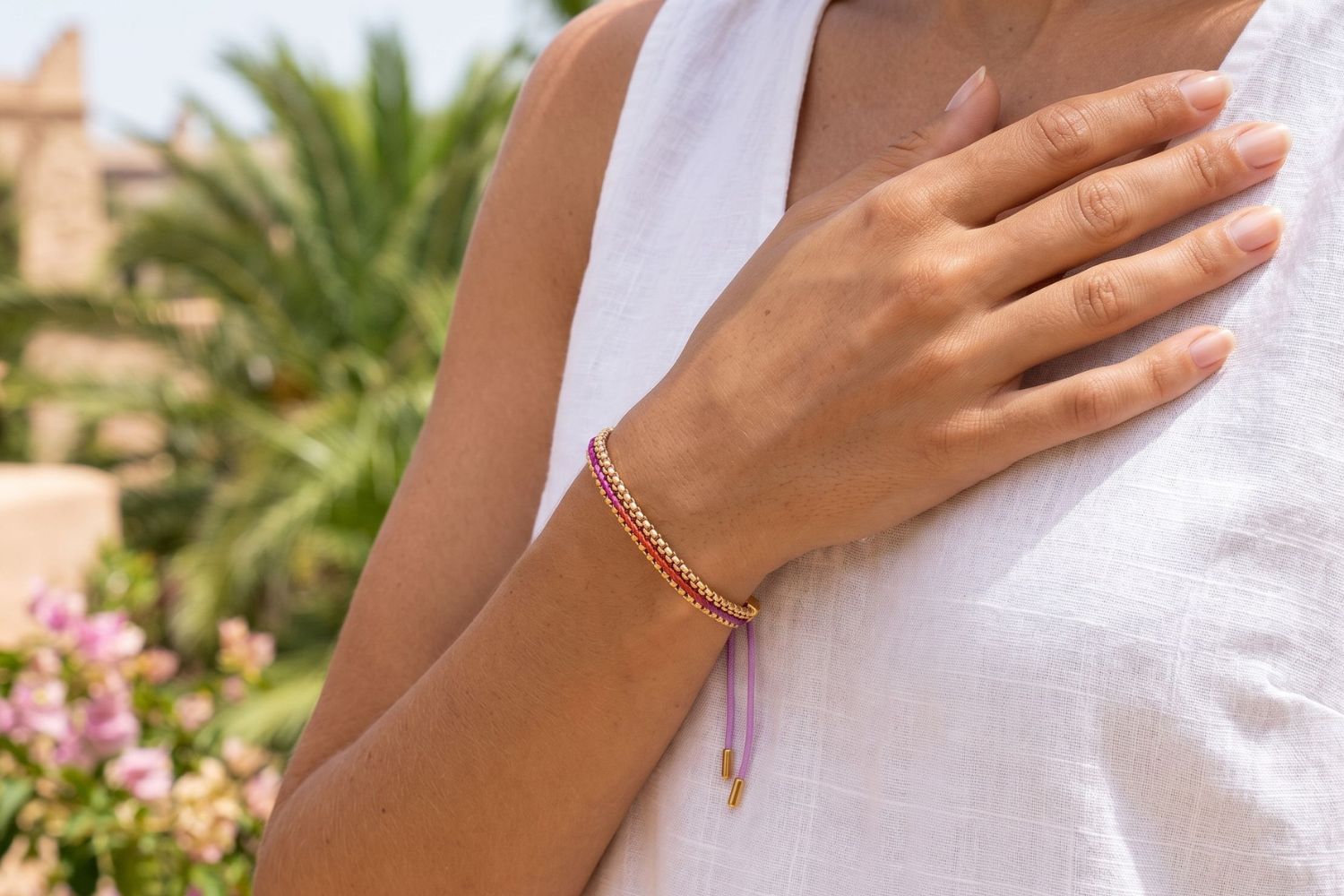 Bloom Moroccan spice woven bracelet styled on the wrist, a warm-toned gold friendship bracelet perfect for stacking and everyday wear.