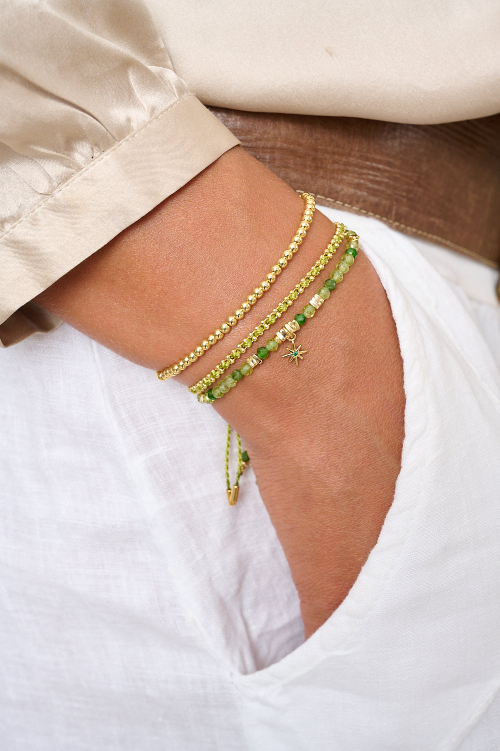 Braid Lime Green & Gold Woven Friendship Bracelet styled on the wrist, showcasing its bold lime-green hues, golden accents, and effortlessly chic boho-luxe design.