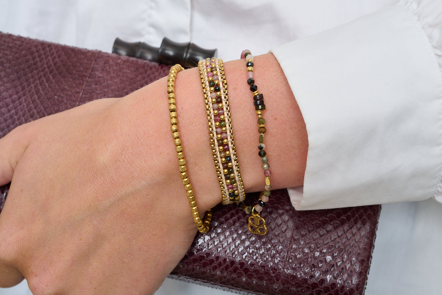 Brava Tourmaline & Gold Bracelet Stack featured on wrist with Boho Betty stacking bracelets