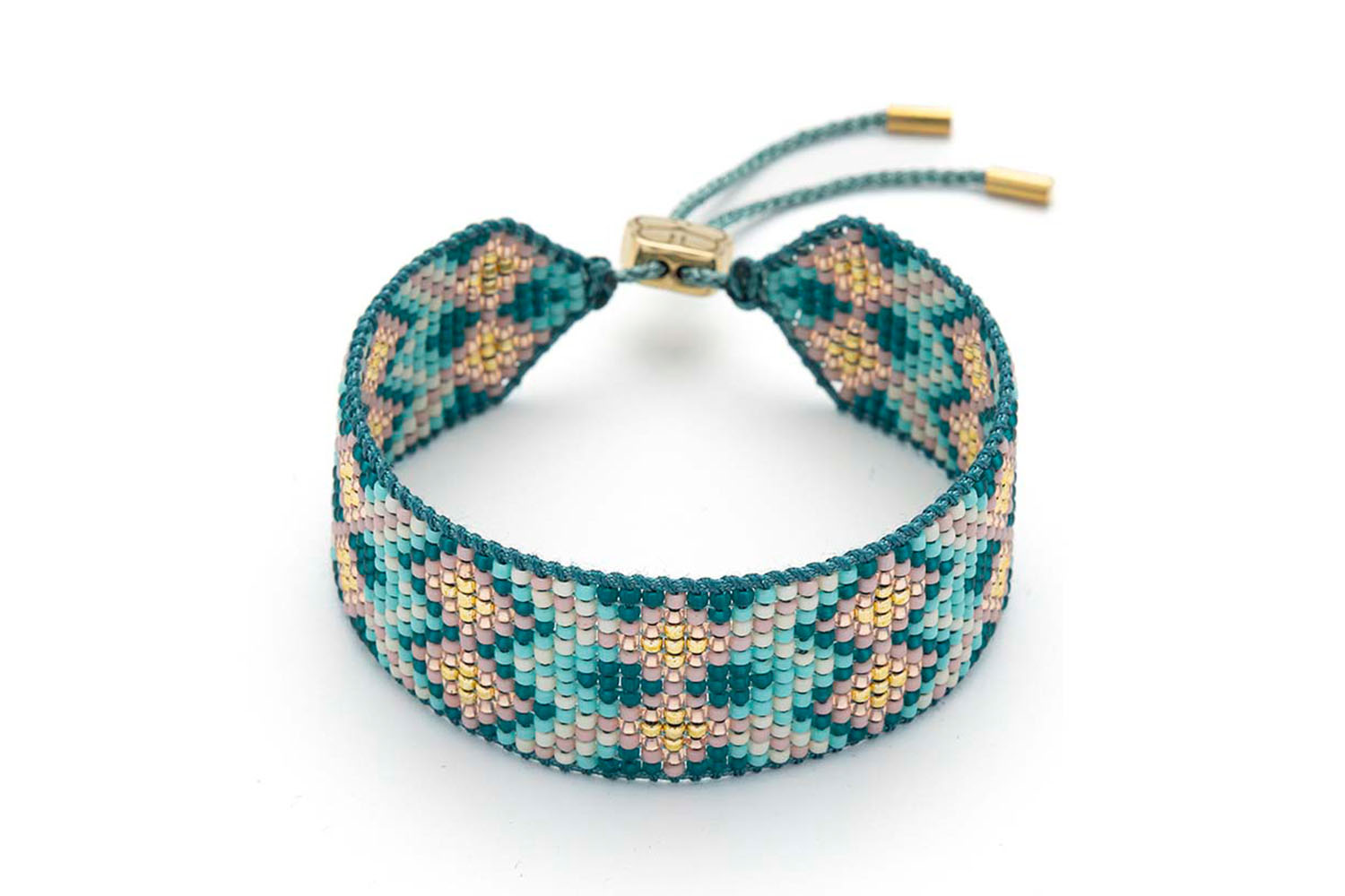 Charlotte Teal Gold Beaded Friendship Bracelet featuring a mix of handwoven teal, blush, and gold Miyuki beads with a 12k gold-plated adjustable slider fastening.