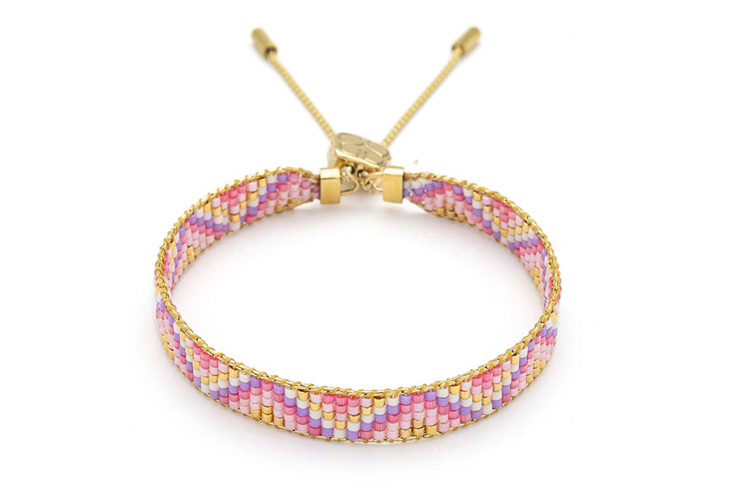 Claudia Pink Gold Friendship Bracelet featuring handwoven Miyuki beads in soft pink, lilac, and gold, finished with a 12k gold-plated adjustable slider fastening.