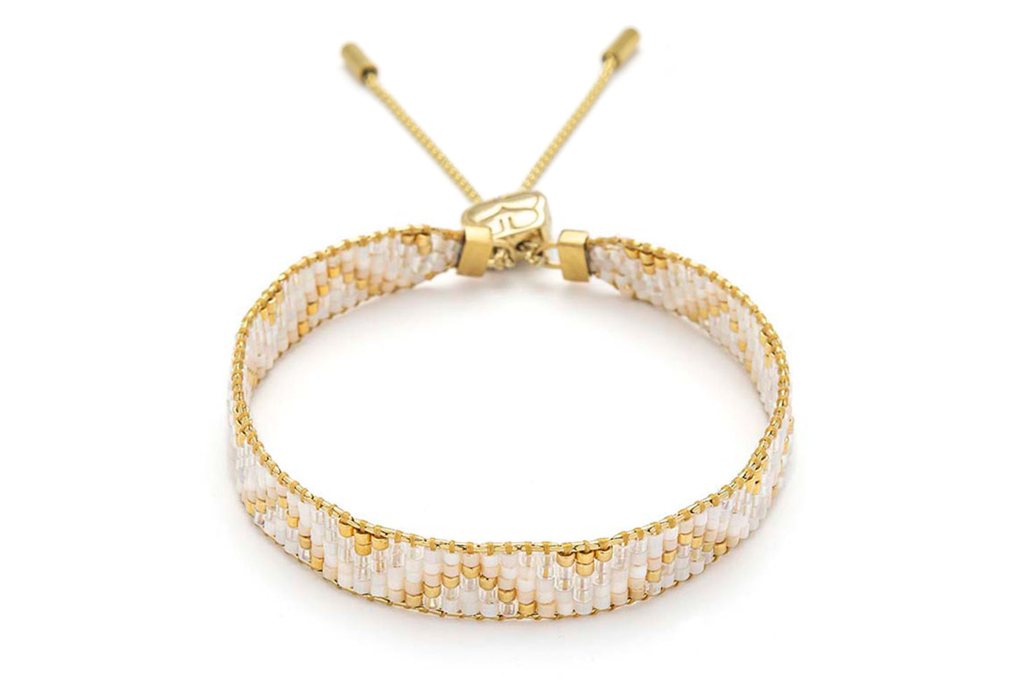 Claudia White Gold Friendship Bracelet featuring pearlescent Miyuki beads, soft vanilla tones, and 12k gold-plated accents with an adjustable slider fastening.