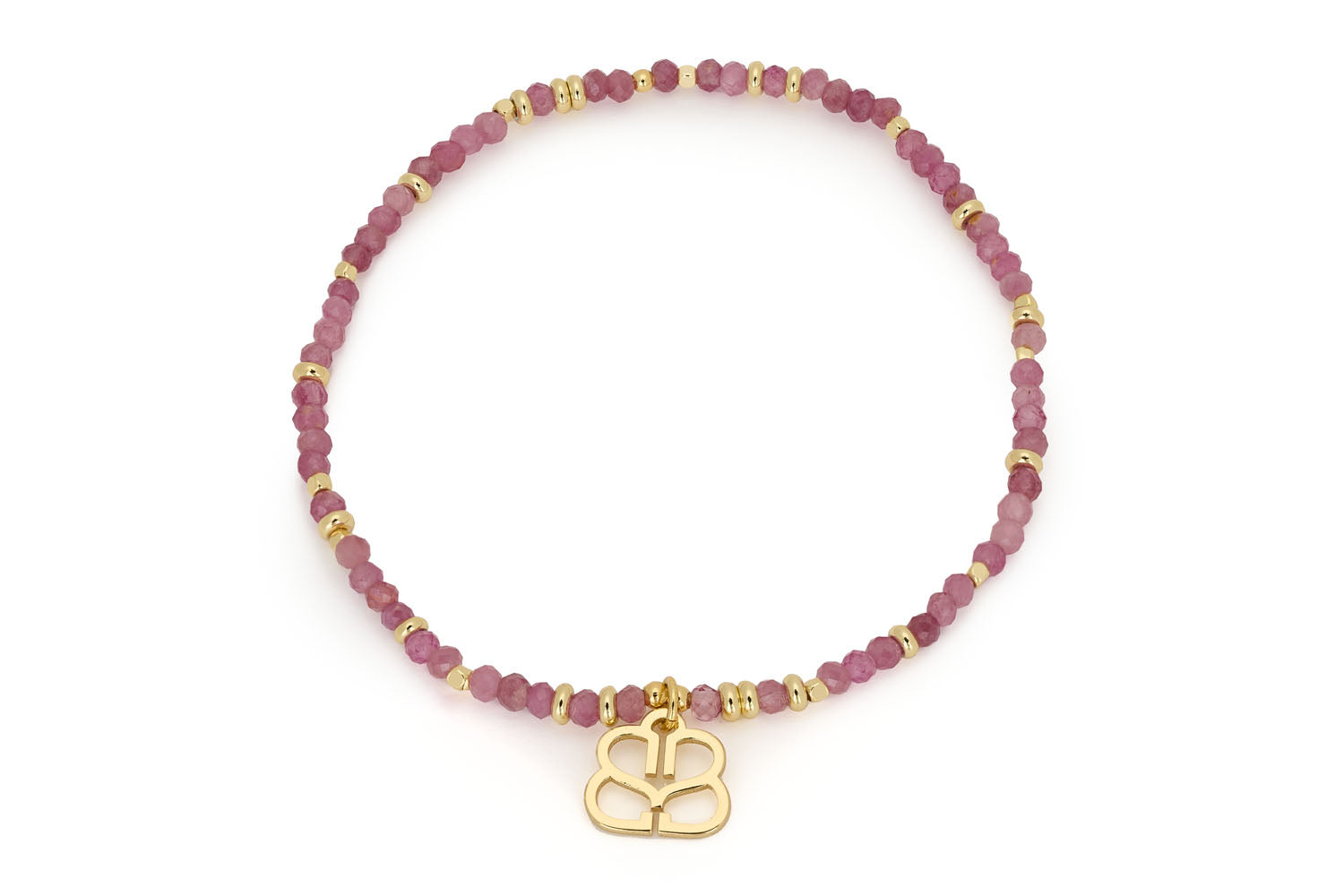 Dash Pink Tourmaline Gold Charm Bracelet featuring vibrant pink tourmaline beads and a delicate 12k gold-plated Boho Betty charm, combining romance, elegance, and boho charm.