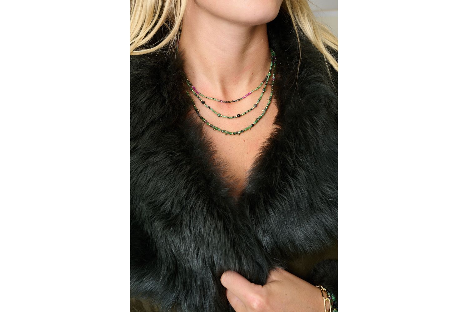 Ember Ruby Zoisite Necklace styled at the collarbone with earthy tones and layered gold jewellery for a meaningful, boho-inspired look.