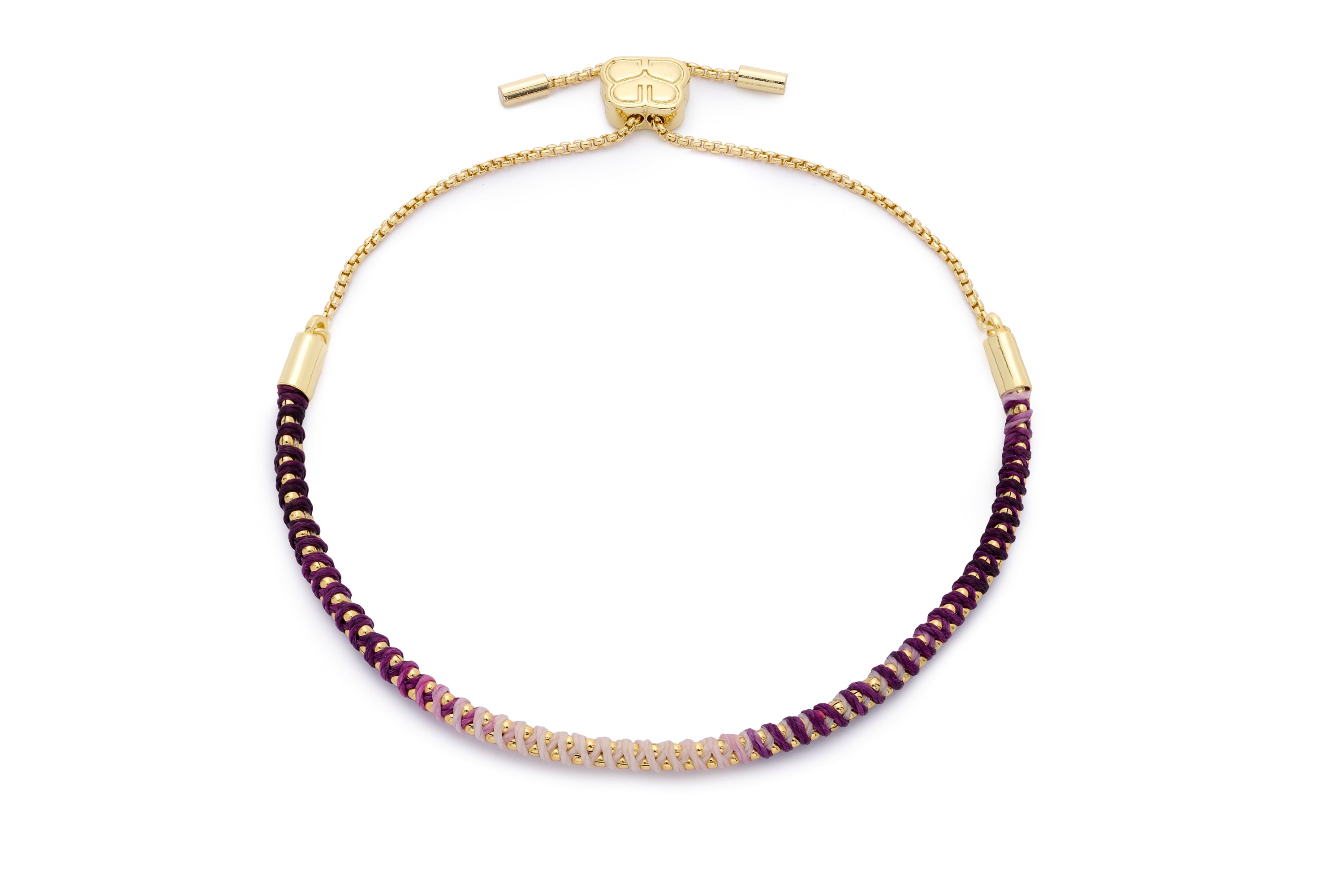 Emelia Ombre Purple & Gold Braided Bracelet featuring a gradient purple cord from plum to lilac, woven around a gold-plated chain with adjustable slider fastening.