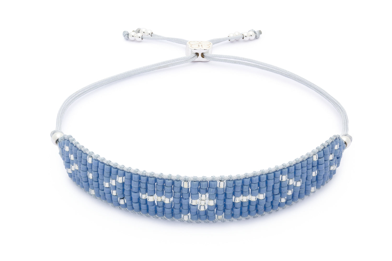 Grace Blue Silver Beaded Friendship Bracelet featuring seven rows of ice blue Miyuki beads and sterling silver-plated accents, with an adjustable slider design for a comfortable fit.