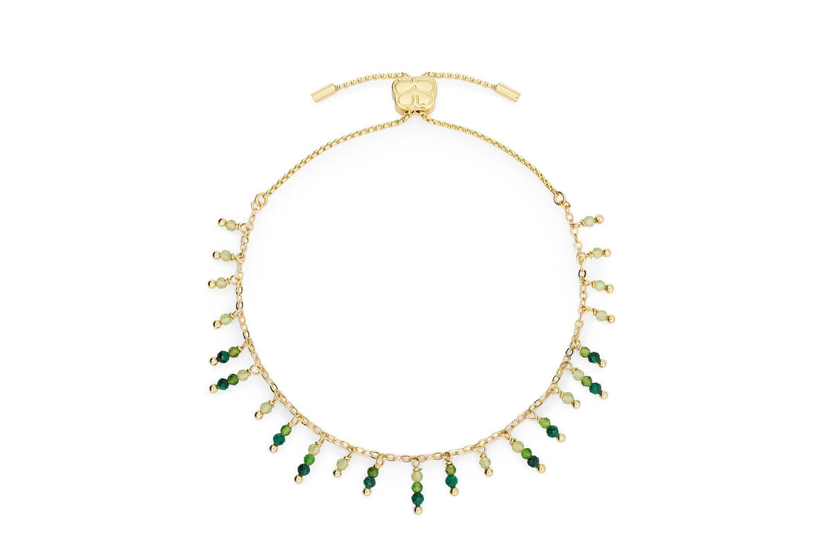 Heather malachite and green gemstone bracelet on white background
