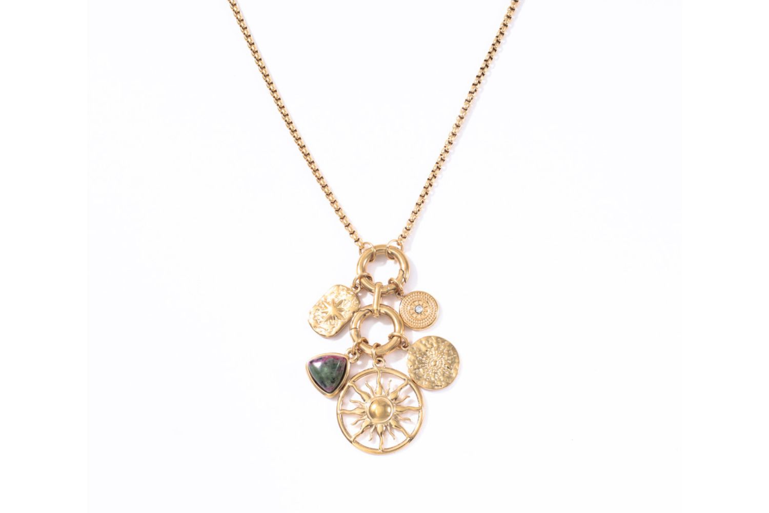 Hemani gold and green epidote long charm pendant necklace with sun and textured disc motifs.