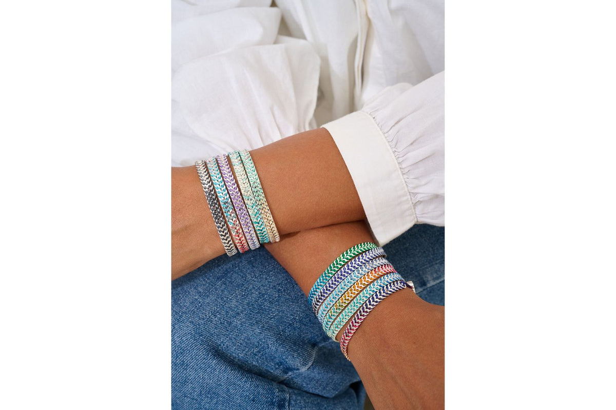 Iztac Midnight Silver braided bracelet styled with Boho Betty stacking bracelets