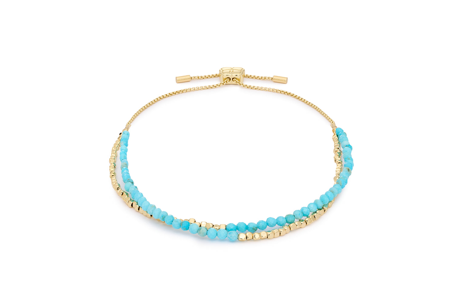 Juniper Turquoise & Gold Multi-Strand Bracelet featuring twin strands of turquoise howlite gemstones with 12k gold-plated brass accents and adjustable slider fit up to 26cm.