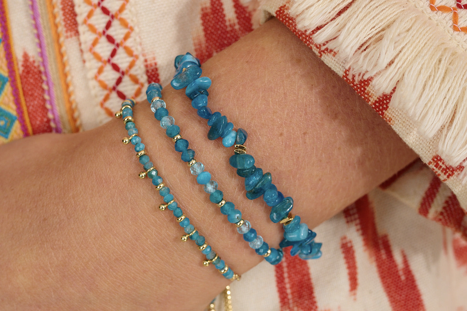 Laguna Apatite Gold Bracelet Stack styled for a coastal-inspired look, with vibrant blue gemstones and radiant gold accents for beachy, feel-good vibes.