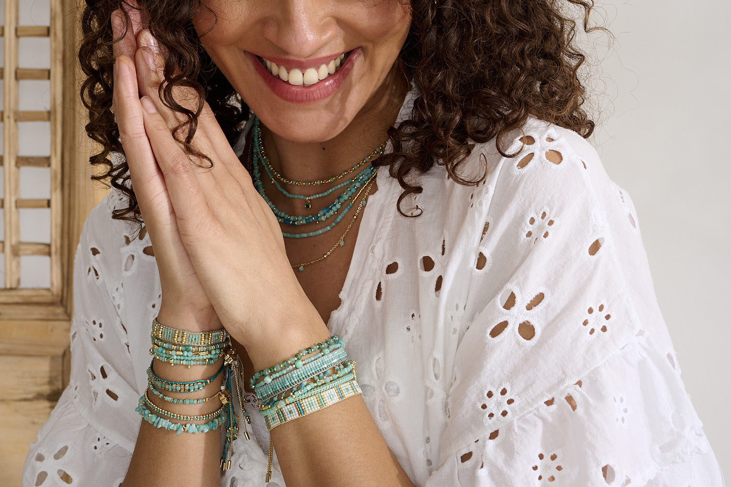 Leilie Green Aventurine & Gold Beaded Friendship Bracelet styled on the wrist, showcasing its earthy green hues, golden accents, and effortlessly chic boho-luxe design.