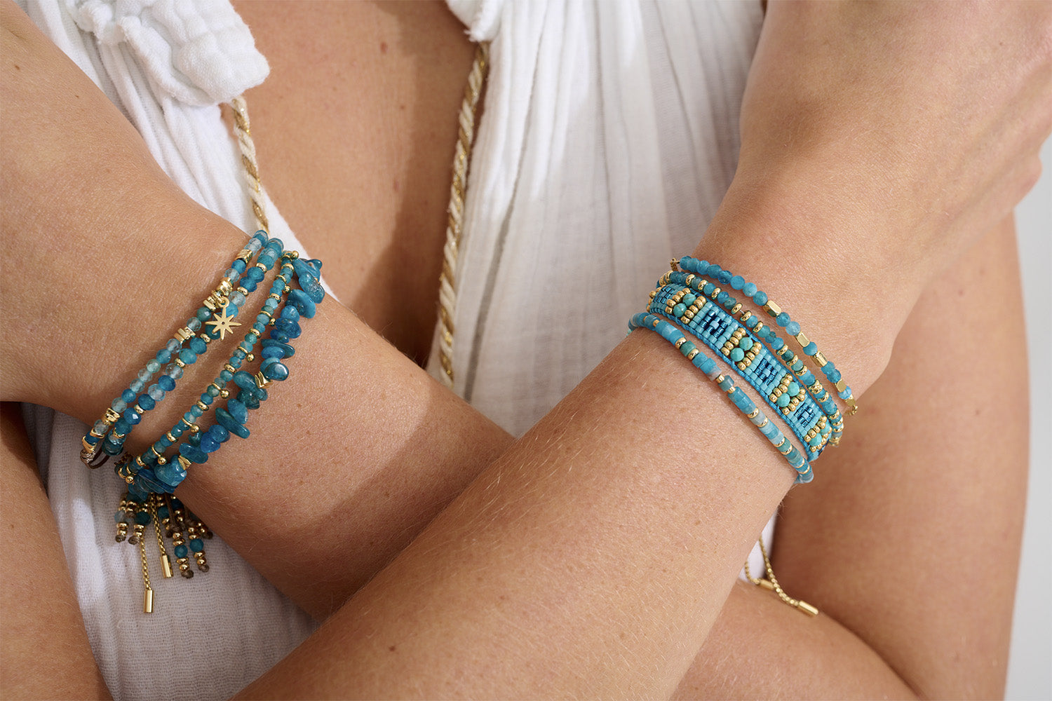 Leilie Turquoise Howlite & Gold Beaded Friendship Bracelet styled on the wrist, showcasing its bold turquoise hues, golden accents, and effortlessly chic boho-luxe design.