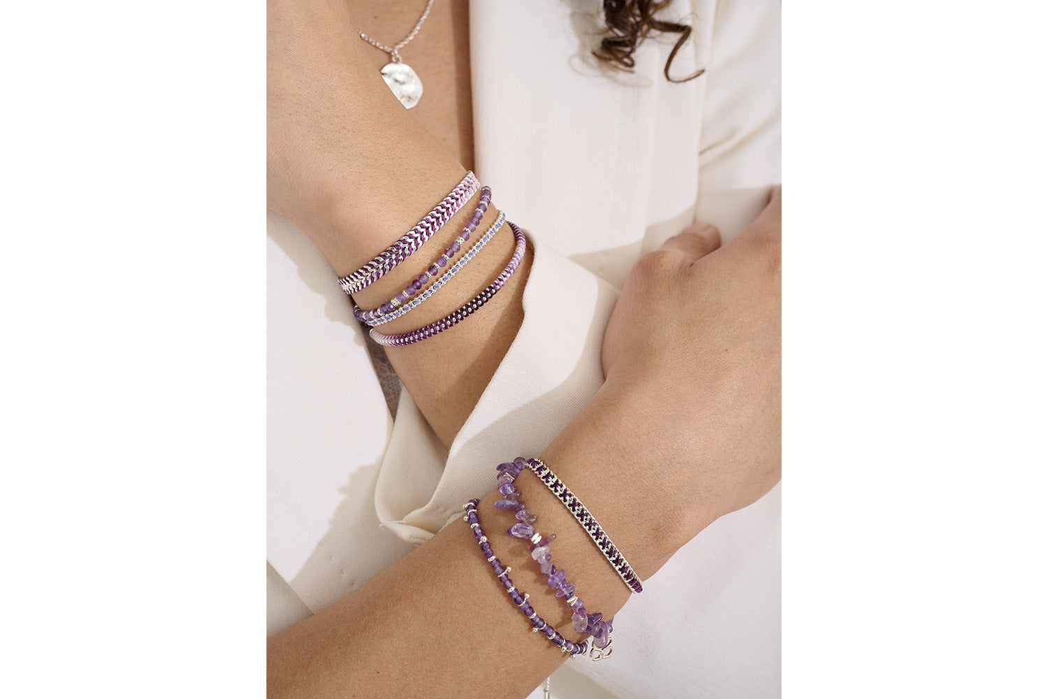 Lilia Silver & Purple Ombre Slider Bracelet styled on wrist, showcasing ombre purple tones and shimmering silver chain.