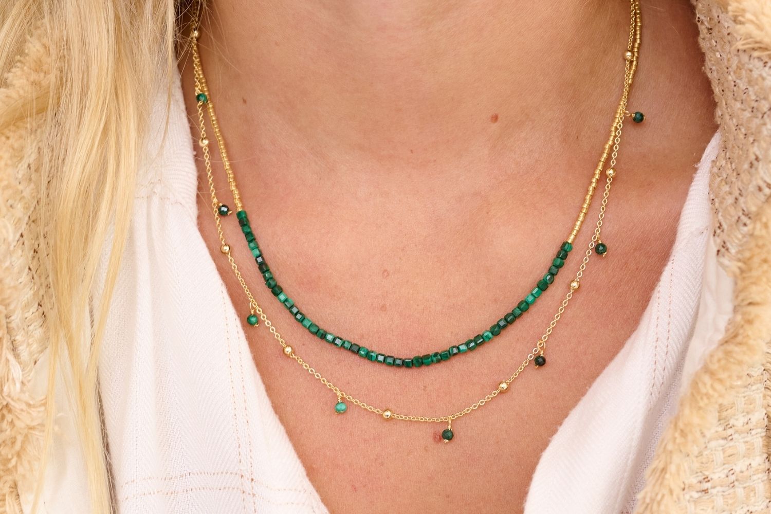 Lily Gold & Malachite Gemstone Layer Necklace styled on the neck, featuring Malachite beads and gold accents, perfect for layering or wearing solo.