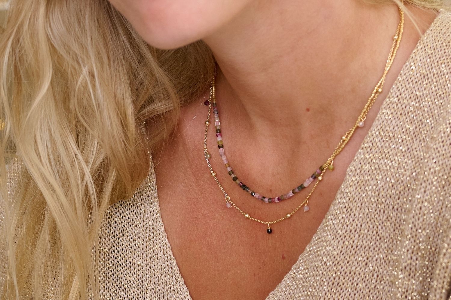 Lily Gold & Tourmaline Beaded Layer Necklace styled on the neck, showing the soft, colourful tourmaline beads and gold accents, perfect for adding bohemian elegance to any look.