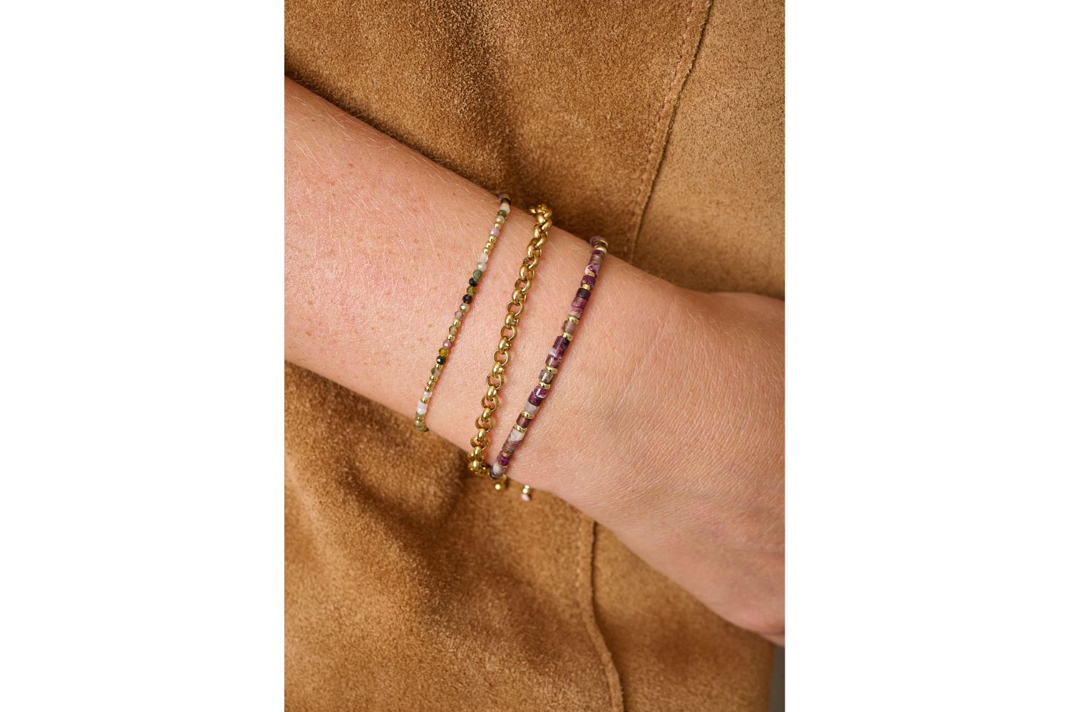 Liv Gold & Tourmaline Friendship Bracelet featured on wrist with Boho Betty stacking bracelets