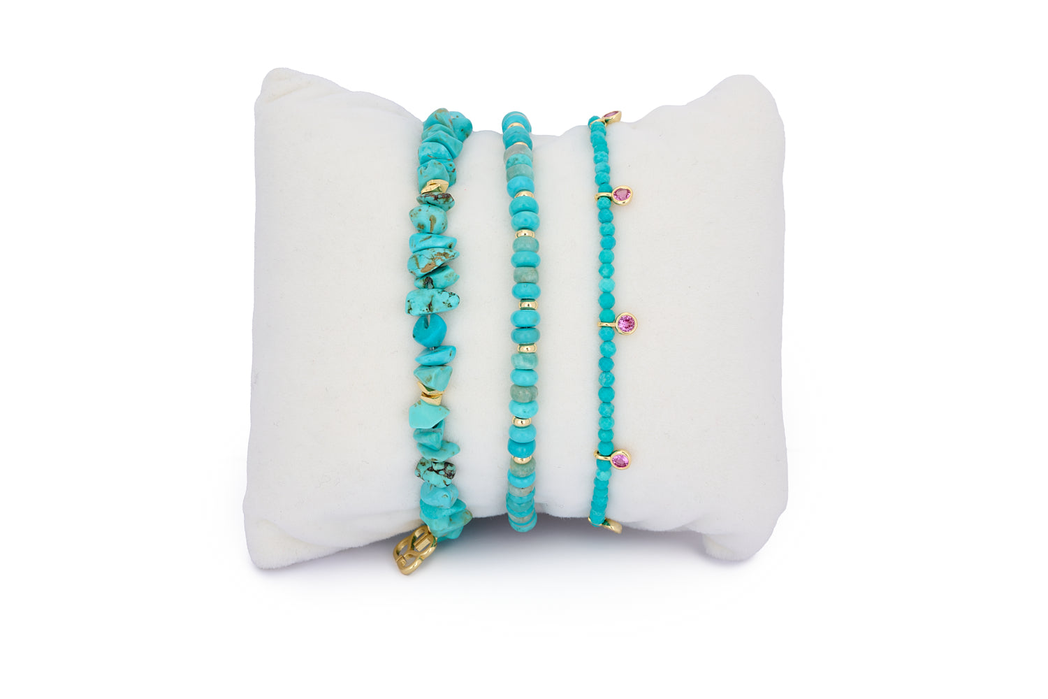 Mamanuca Turquoise Howlite & Gold Bracelet Stack featuring raw and polished turquoise beads, gold accents, and crystal charm details in a tropical-inspired trio.