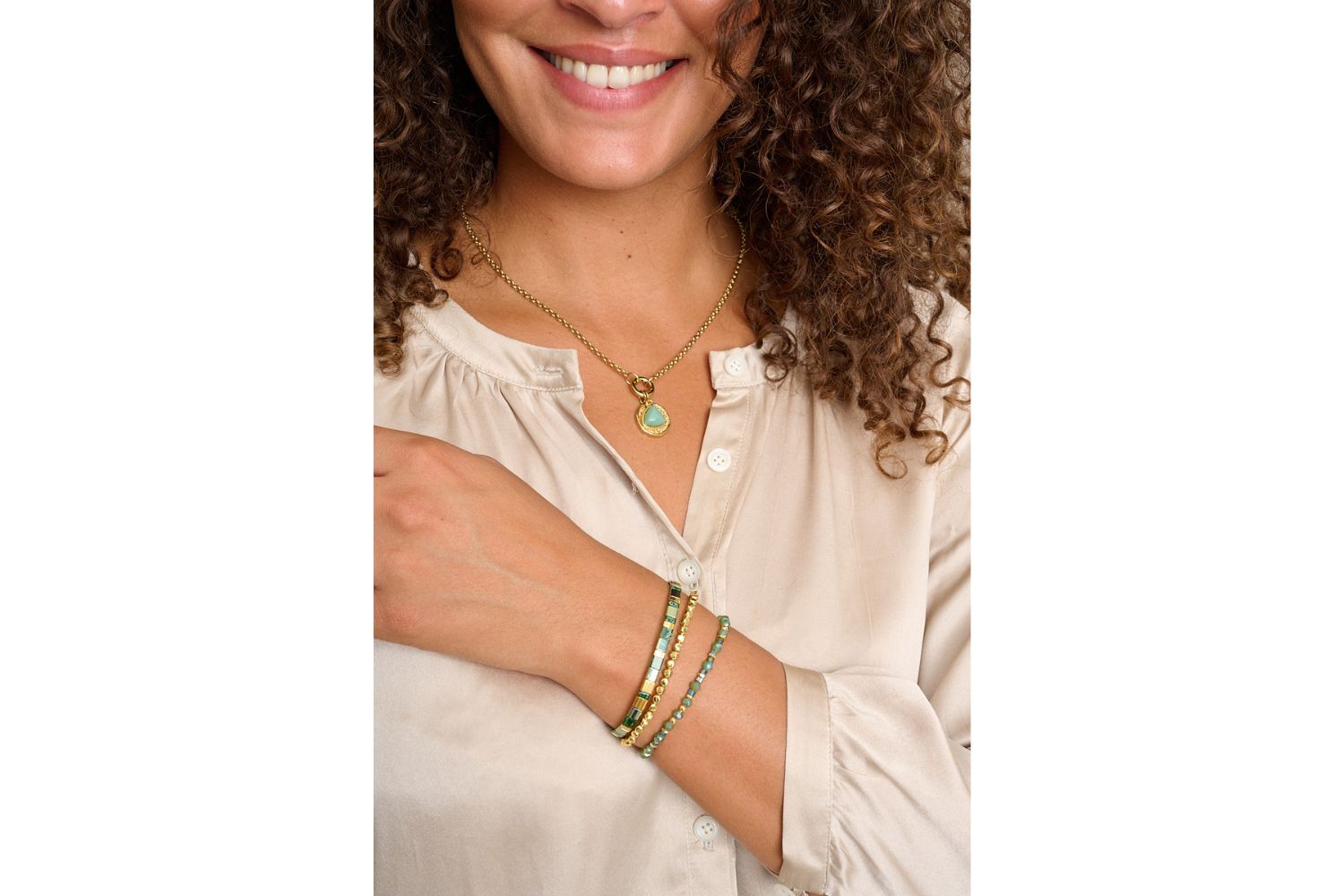 Mustique Gold & Green Beaded Bracelet Stack featured on wrist with Boho Betty stacking bracelets