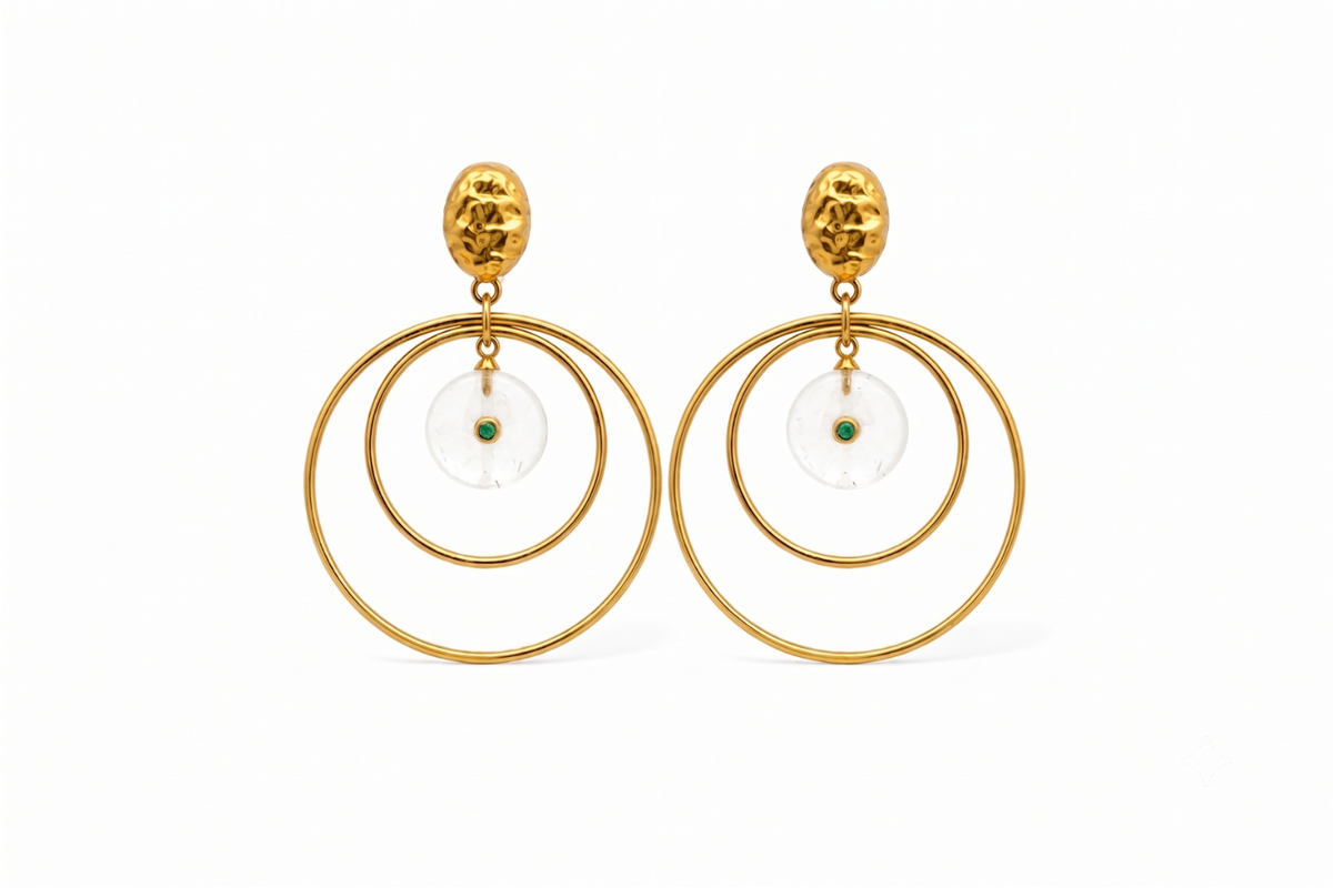 Onda White Jade Gold Statement Earrings featuring white jade gemstone drops suspended inside double gold hoops with green crystal detail.