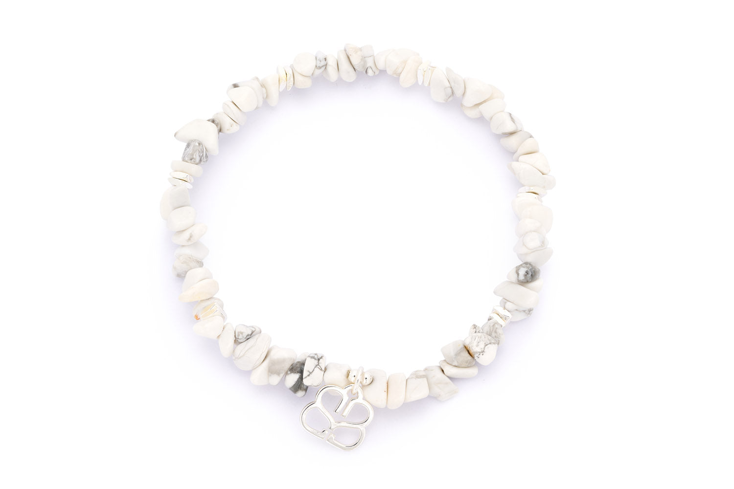 Sana Silver Beaded White Howlite Crystal Bracelet featuring natural white howlite gemstones and sleek silver-plated accents, with a flexible stretch design for a comfortable fit.