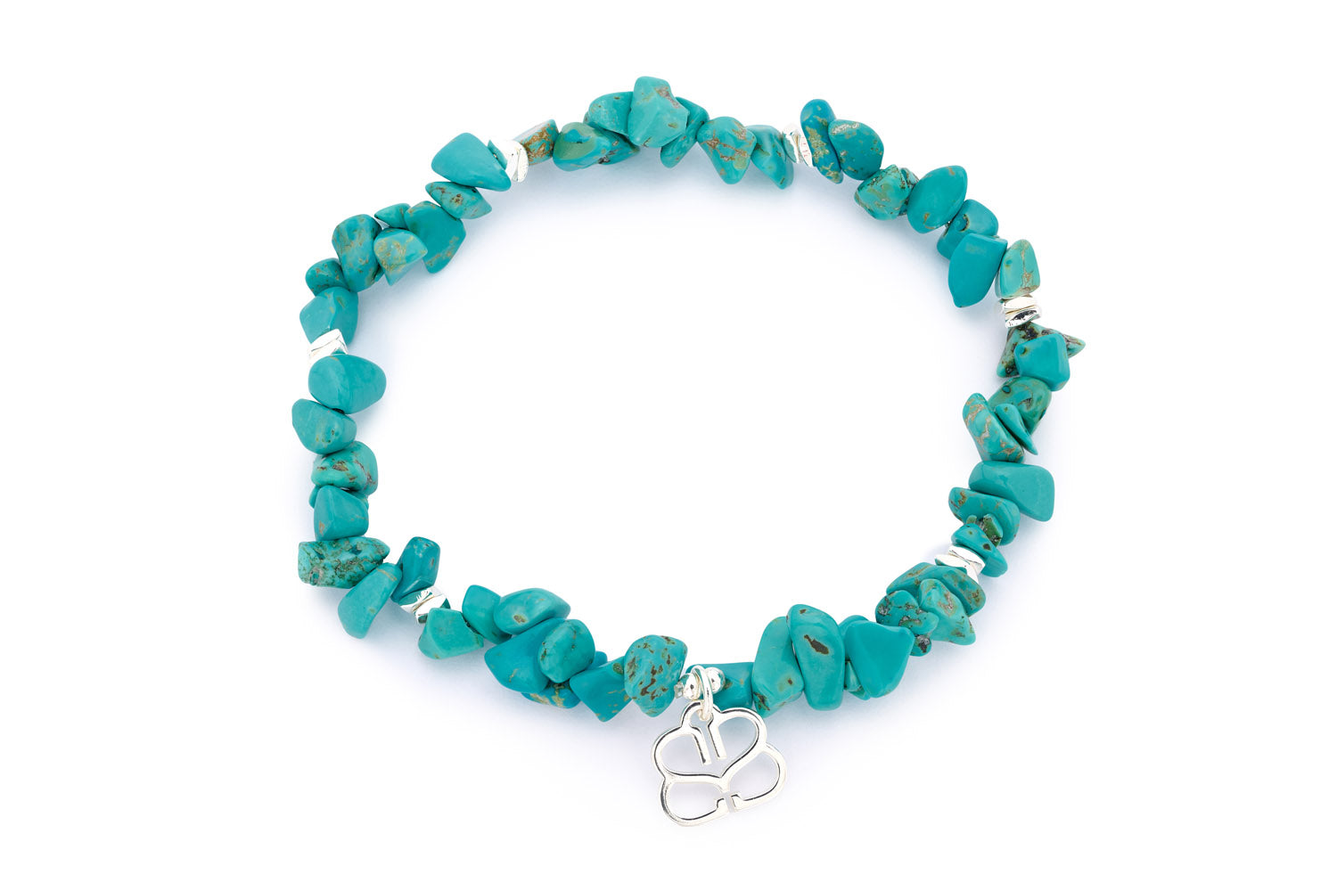 Sana Turquoise Howlite Silver Bracelet featuring bright turquoise howlite beads and silver-plated accents, with a flexible stretch design for a comfortable fit.