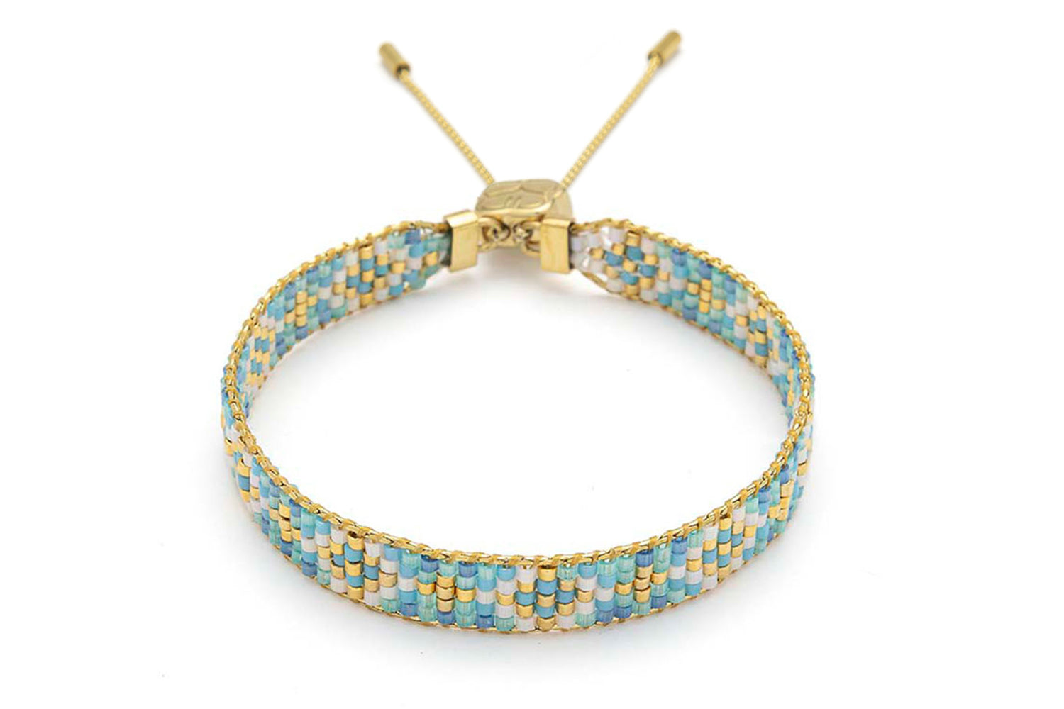 Saskia Aqua Gold Friendship Bracelet featuring handwoven Miyuki beads in soft aqua, blue, and gold, finished with a 12k gold-plated adjustable slider fastening.