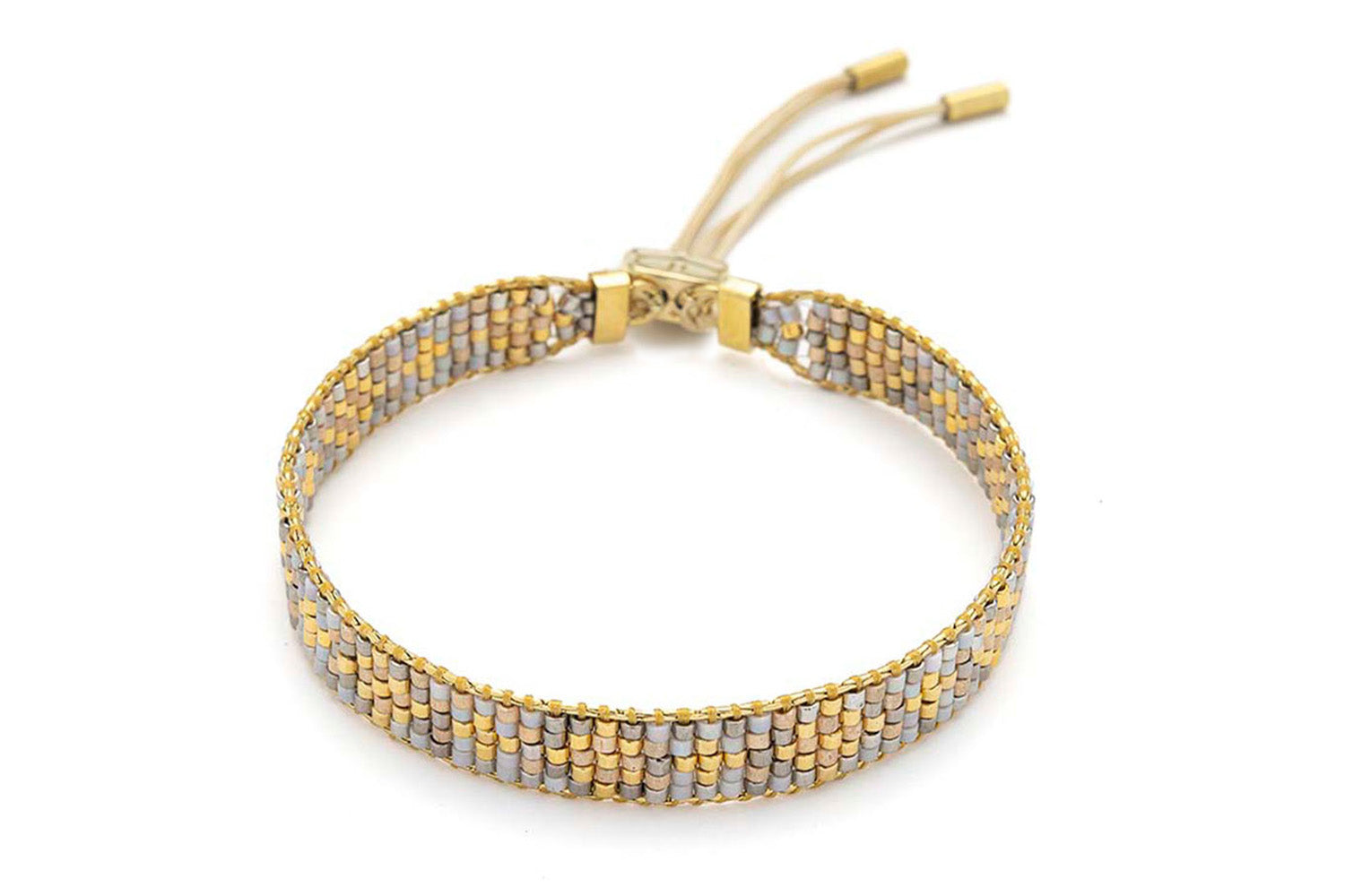 Saskia Taupe Gold Friendship Bracelet featuring taupe, grey, and gold Miyuki beads, accented with 12k gold-plated details and an adjustable slider fastening.