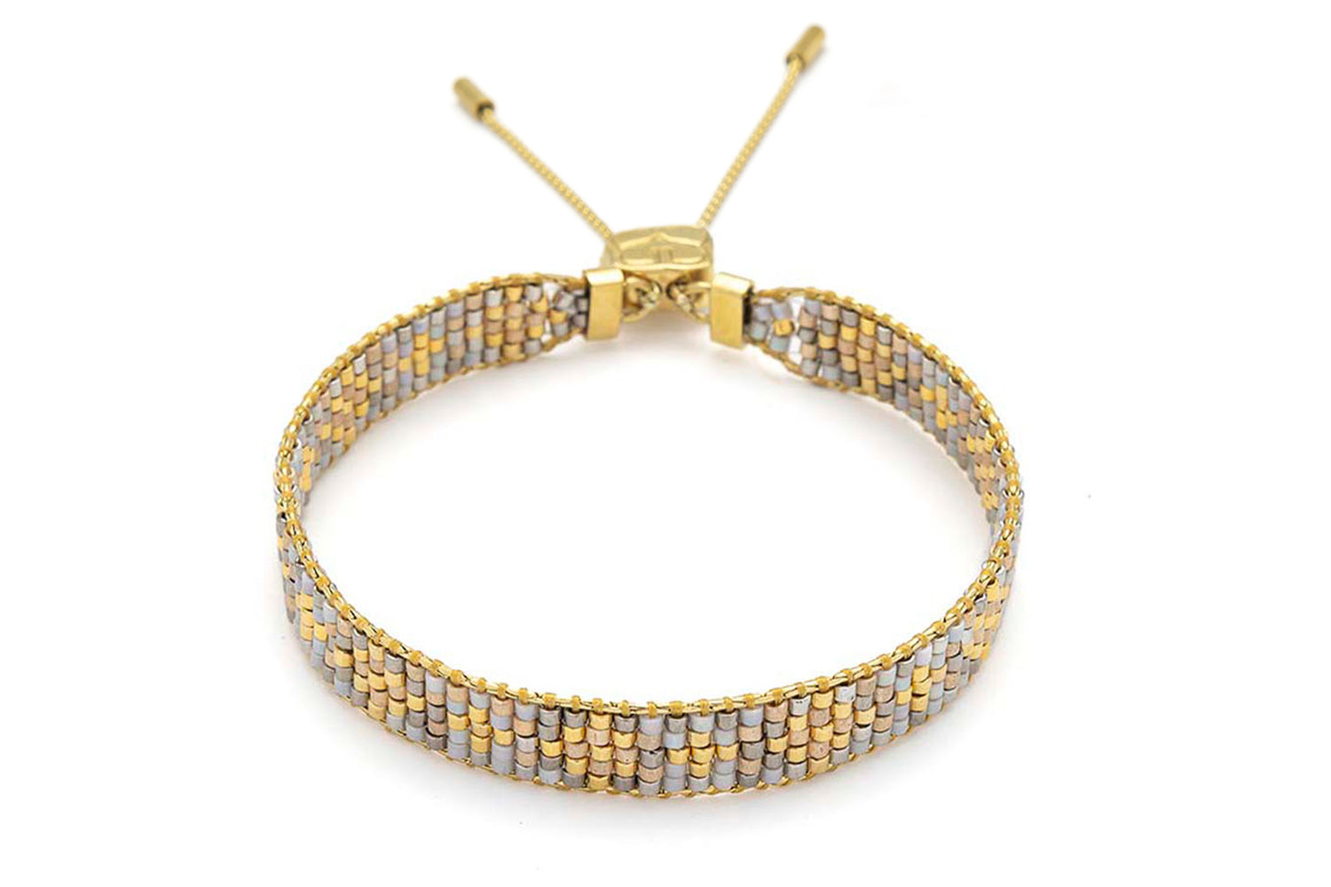 Saskia Taupe Gold Friendship Bracelet featuring taupe, grey, and gold Miyuki beads, accented with 12k gold-plated details and an adjustable slider fastening.