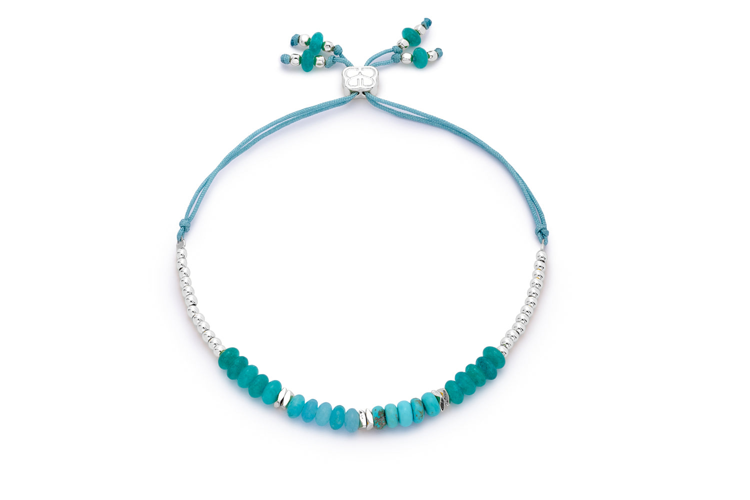 Serena Silver, Turquoise Howlite & Jade Gemstone Bracelet featuring natural turquoise howlite and jade beads with sterling silver-plated accents, finished with an adjustable cord.
