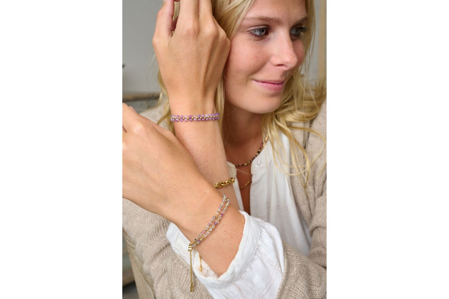 Tanna Amethyst & Gold Bracelet Stack styled on wrist with layered Boho Betty gold and gemstone bracelets