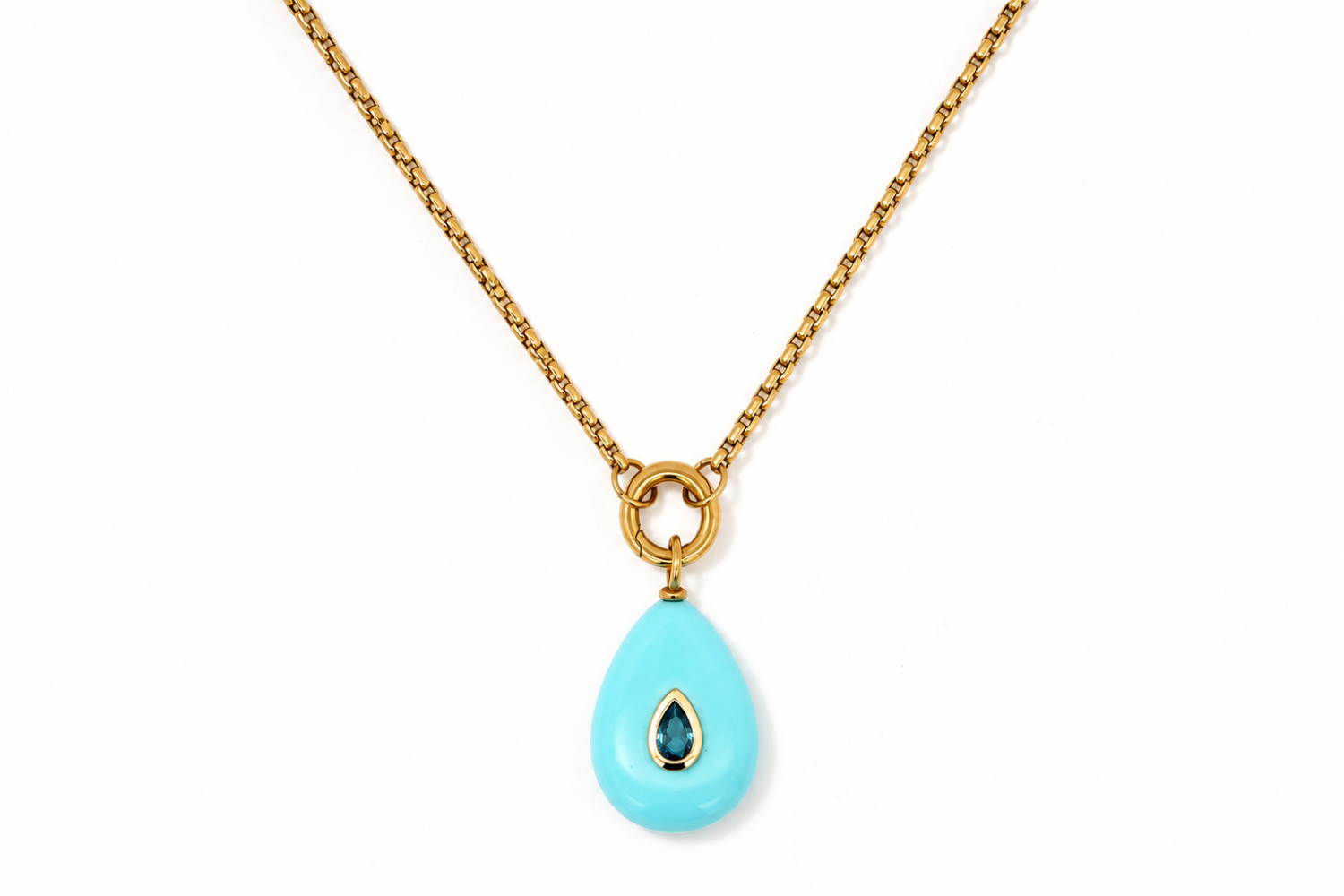 Thalia Long Turquoise Howlite Teardrop Pendant Necklace featuring a turquoise howlite gemstone with a blue crystal on a waterproof 14k gold PVD chain.