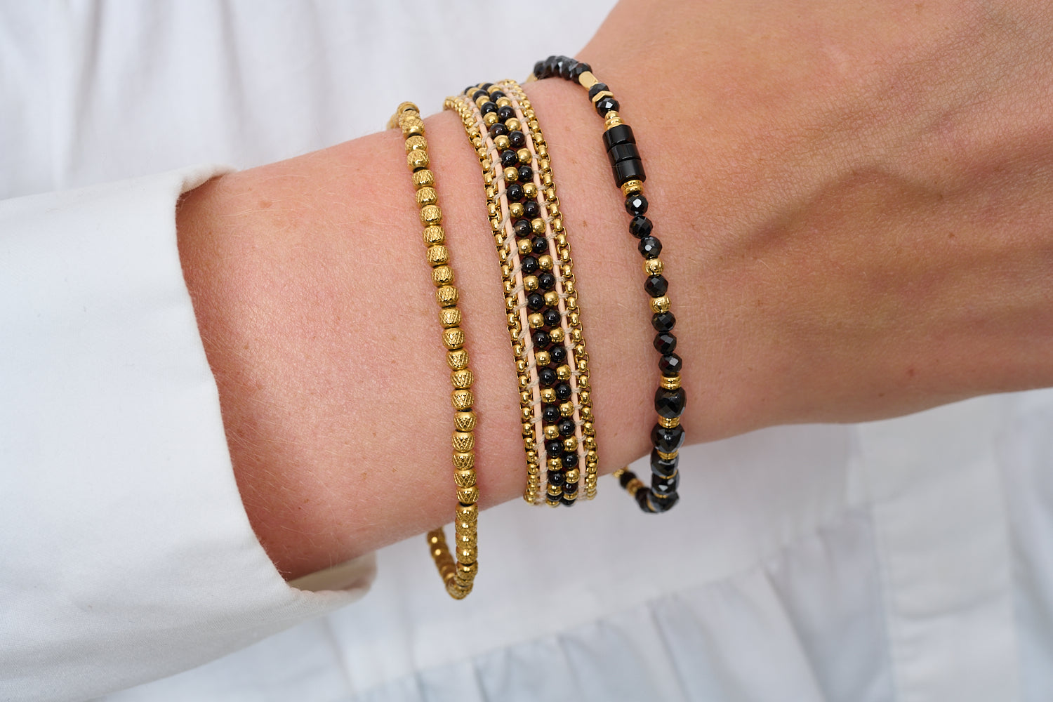 Yasmin Black spinel bracelet stacked with the Isla and Eleanor Boho Betty bracelets for a bold everyday look.

