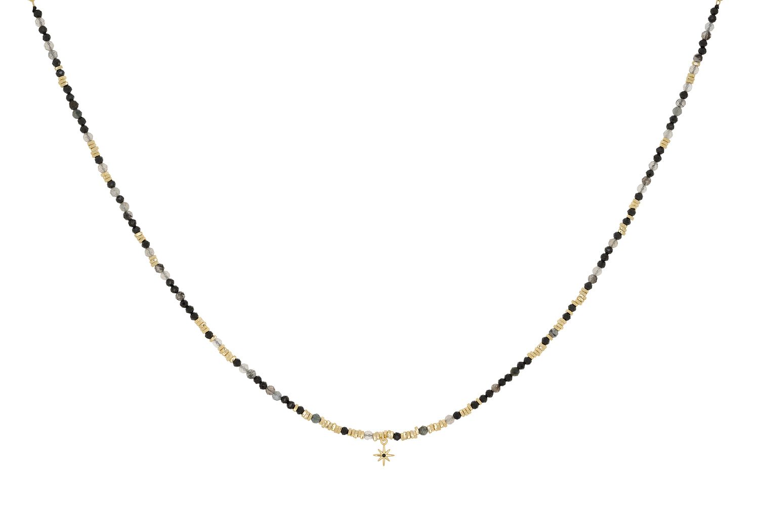 Yolanda gold necklace with black rutilated quartz beads and starburst charm on white background
