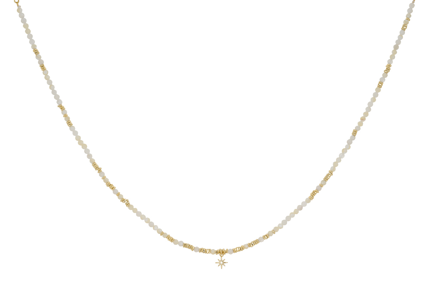 Yolanda gold necklace with moonstone and pearl beads and starburst charm on white background