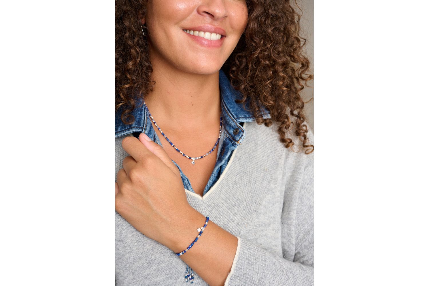 Yolanda silver kyanite gemstone necklace featured on neckline with Boho Betty necklace layers.