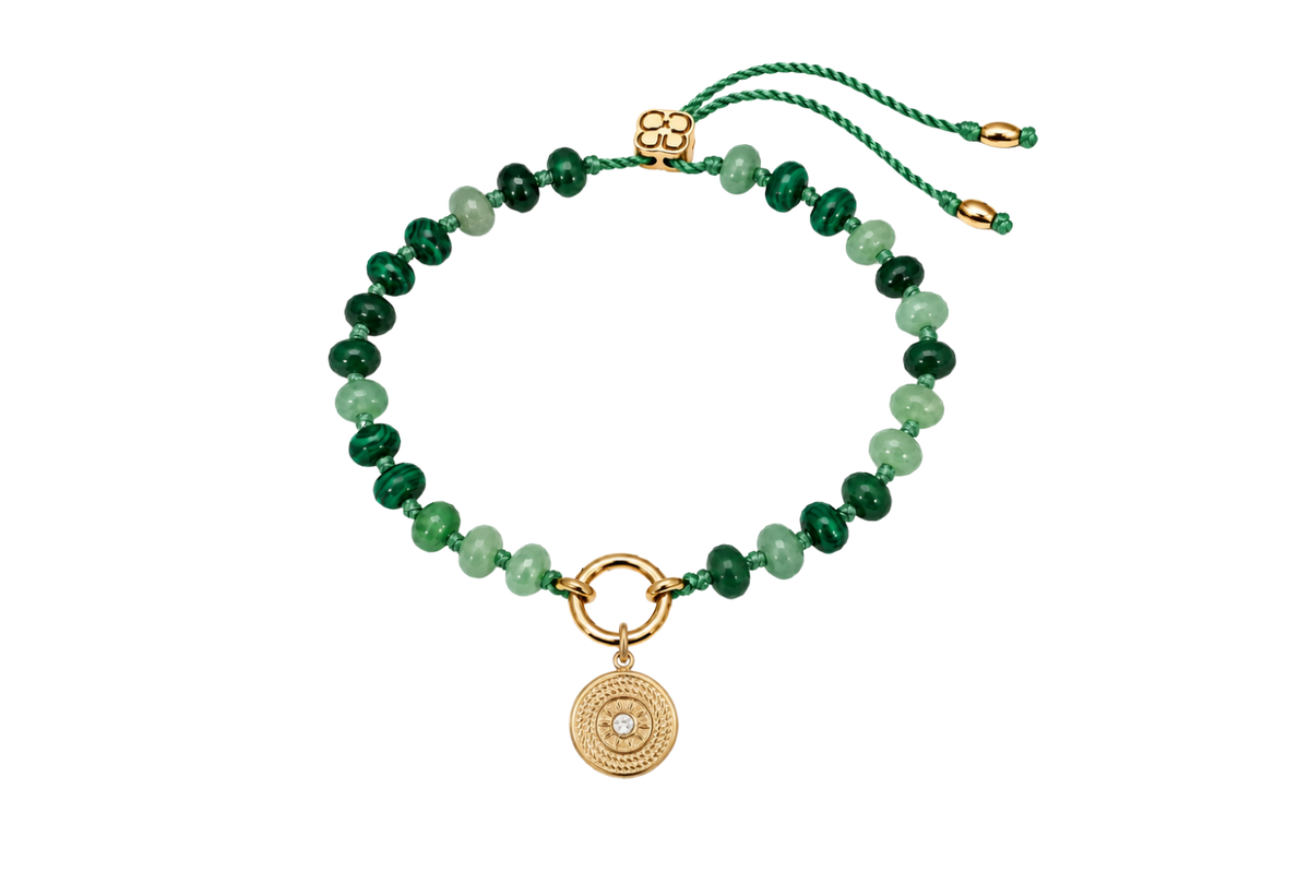 Zaha Green Mix gold charm carrier bracelet finished with the gold Lucia sun compass charm, a waterproof Boho Betty gemstone bracelet.
