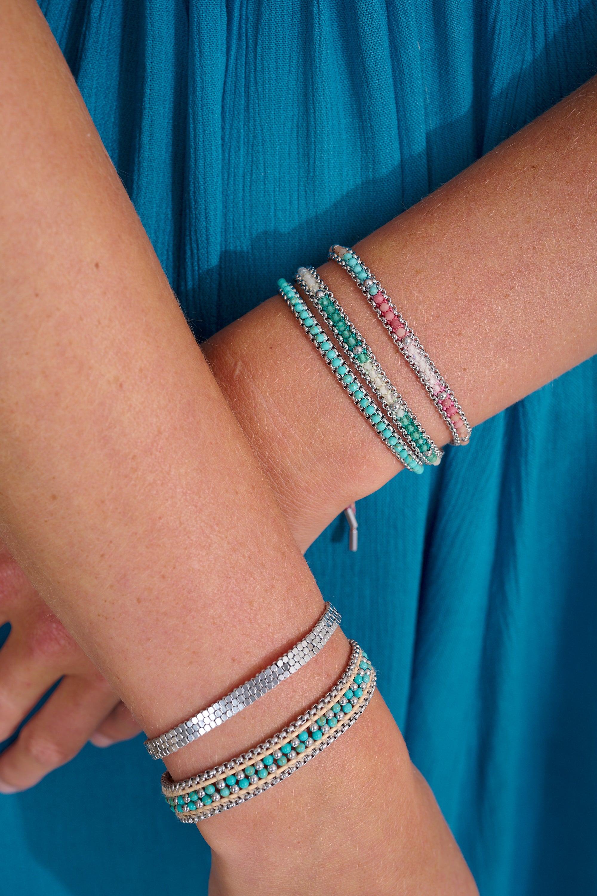 Zena Turquoise Howlite Silver Bracelet styled in a summer bracelet stack for a colourful, carefree everyday look — perfect for gifting or mindful jewellery lovers.